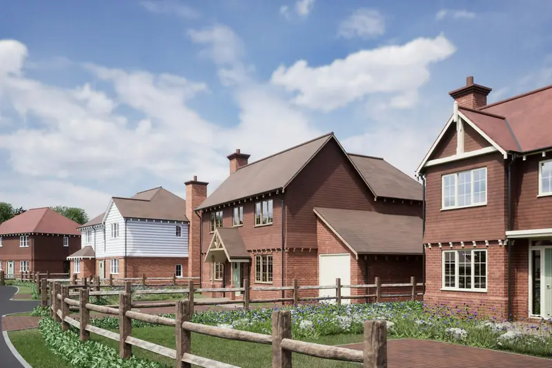 Red brick homes with block paved drives (illustrative rendering)