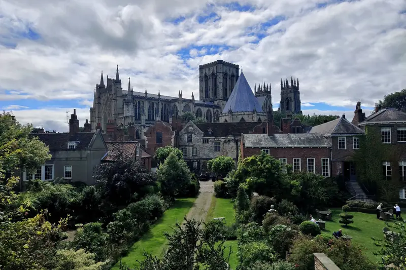 York Minster rising above gardens and rooftops in the city